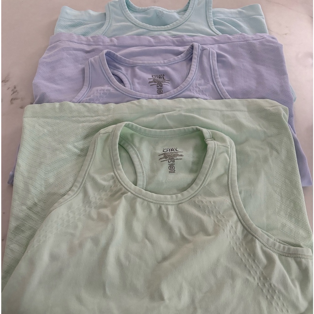 3 Athleta Girl tanks.